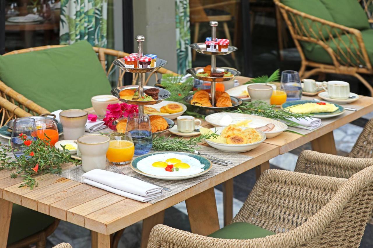 Hotel Jadali & Spa マラケシュ エクステリア 写真 A breakfast table