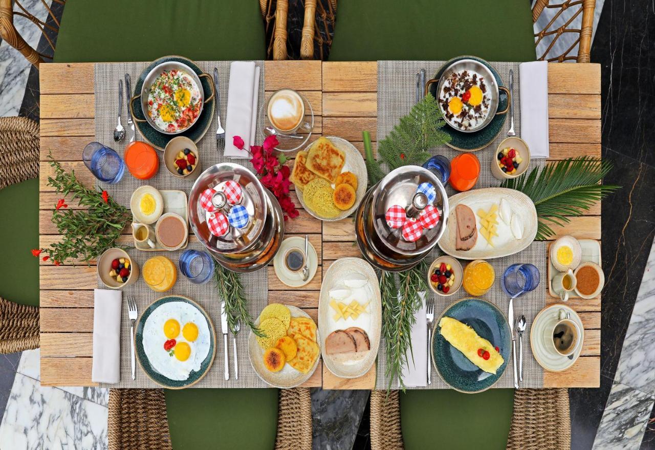 Hotel Jadali & Spa マラケシュ エクステリア 写真 A typical breakfast table